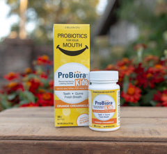 Happy child with healthier teeth and gums after using ProBiora Kids