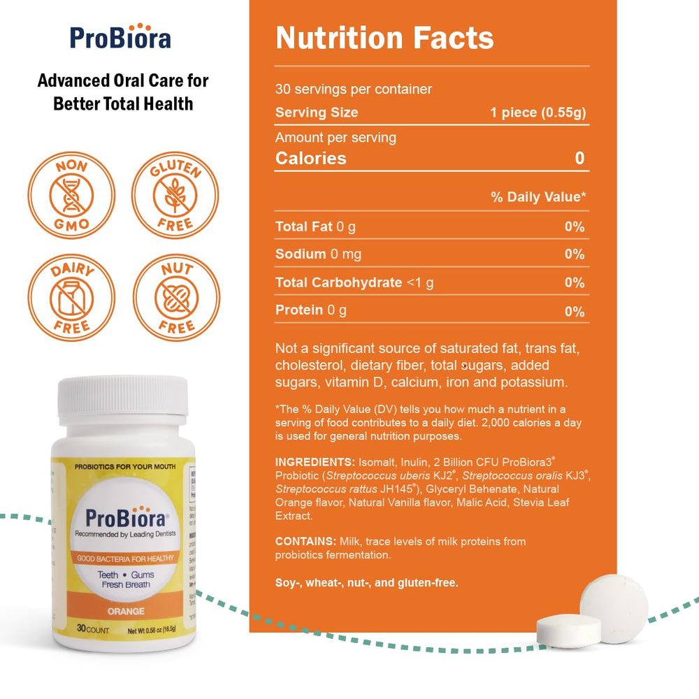 Close-up of an orange-flavored probiotic tablet