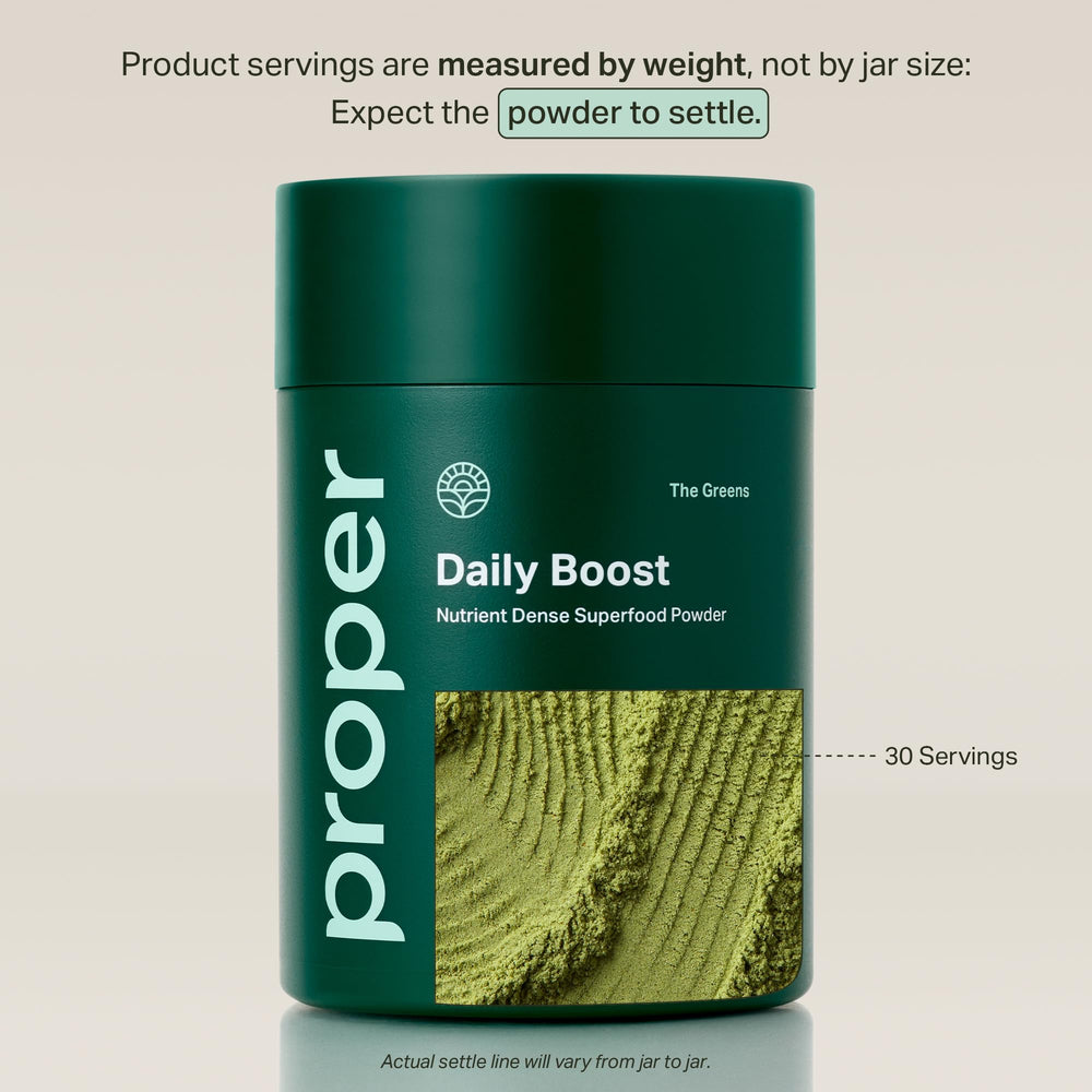 Scoop of Proper The Greens Daily Boost apple-flavored powder