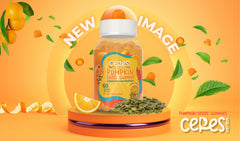 Close-up of orange-flavored pumpkin seed oil gummies