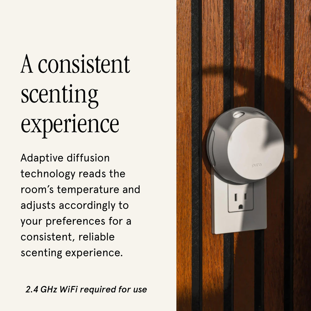 Smartphone displaying Pura app controlling fragrance diffusion