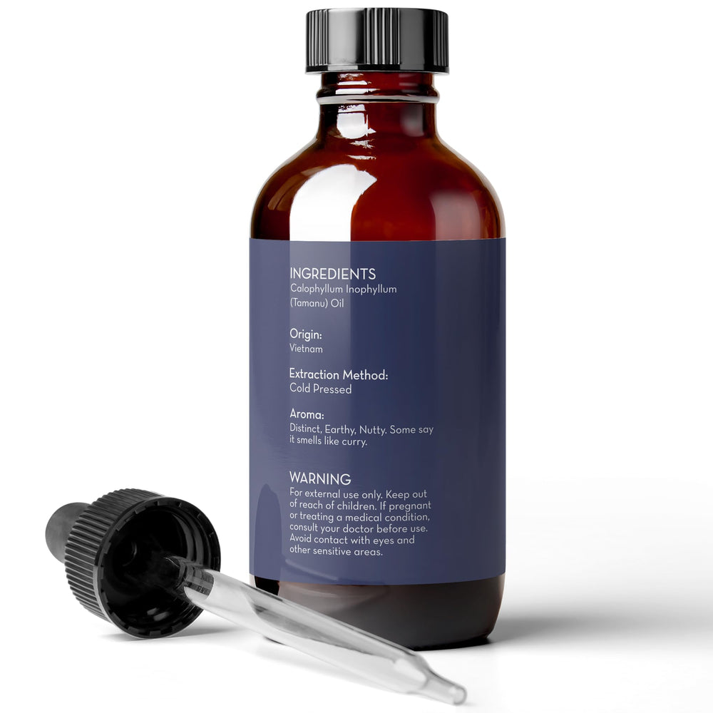 Massaging Tamanu Oil into damp skin to aid absorption