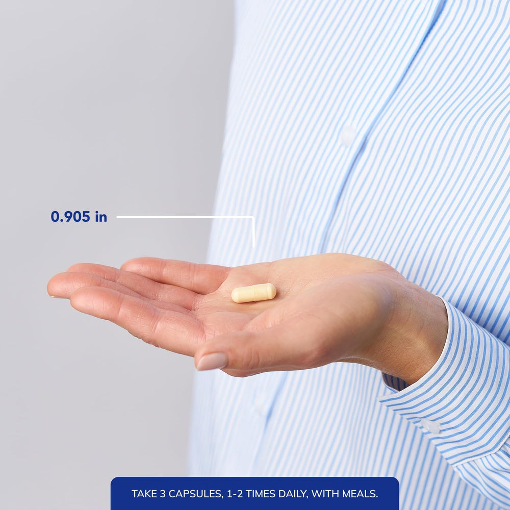 Pure Encapsulations Nutrient 950 capsules in hand, convenient daily dosing.