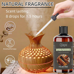 Clear glass bottle labeled sandalwood essential oil