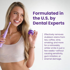 Toothbrush dipped into toothpaste with Simply Purple powder for whitening