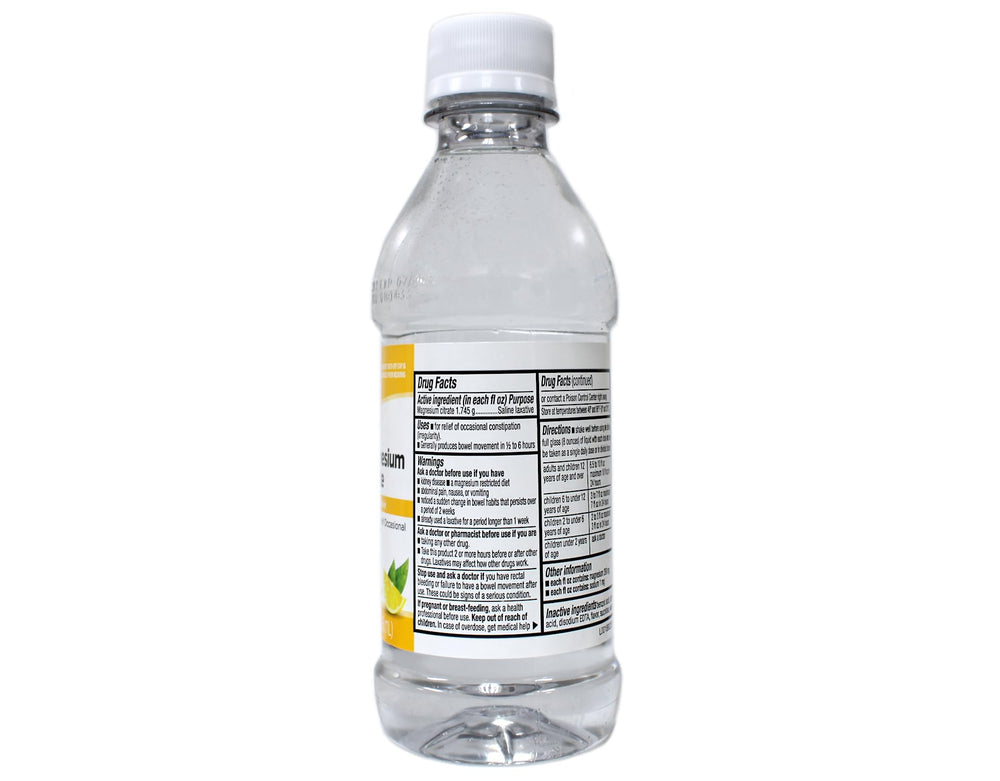 Magnesium citrate oral solution bottle held for scale, 10 fl oz