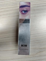 QIC Eyebrow Serum on back of hand demonstrates fast absorption.