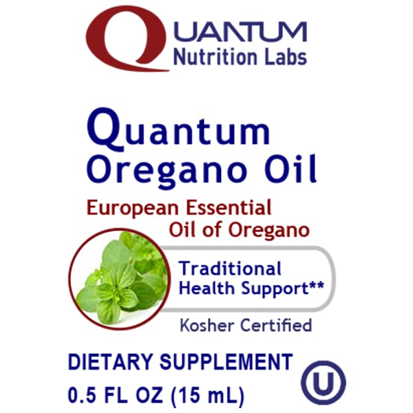 Close-up of oregano oil liquid drops in bottle label
