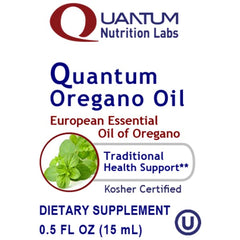 Close-up of oregano oil liquid drops in bottle label