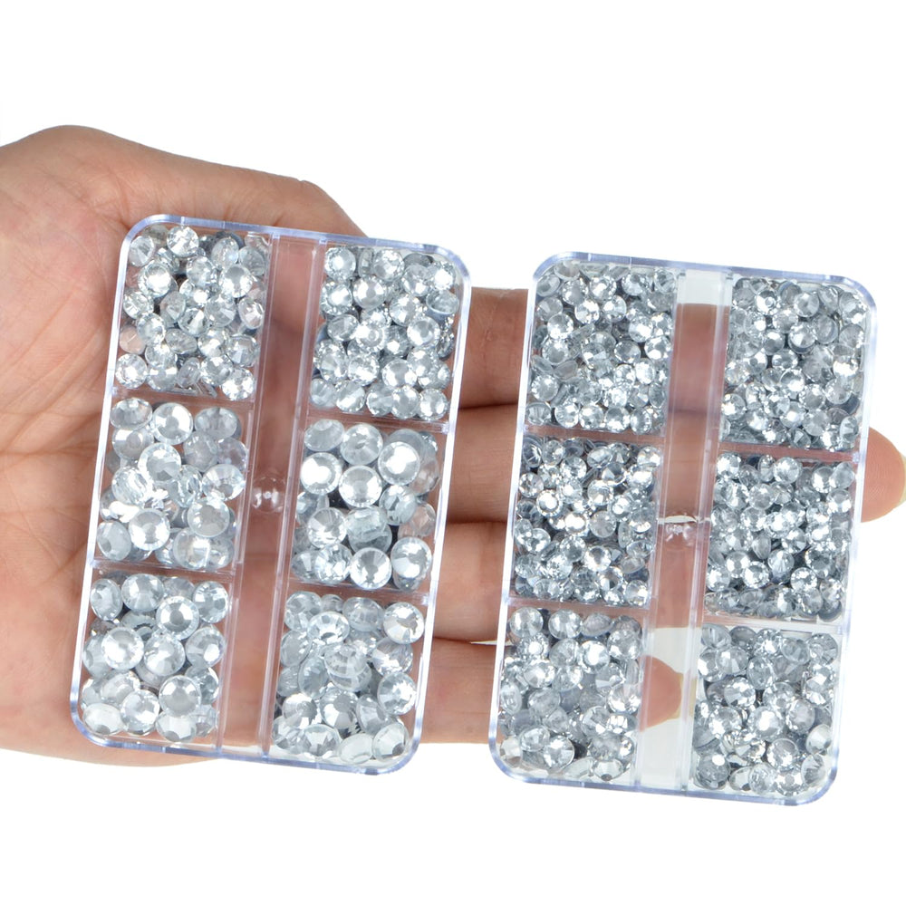 QOGIR hotfix rhinestones application shows quick heat-setting on garments.