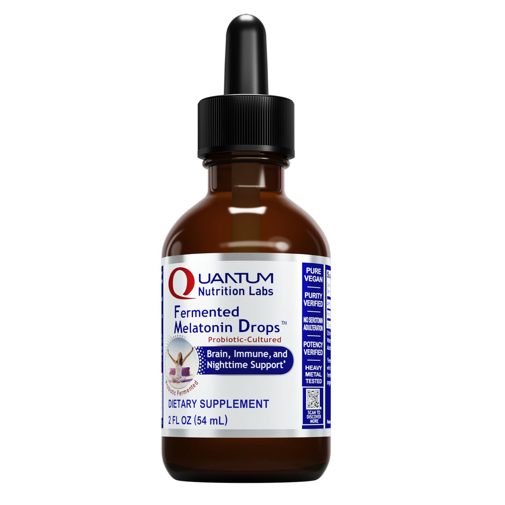 Bottle of Quantum Nutrition Labs Fermented Melatonin Drops in amber glass