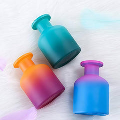 QUUPY grey diffuser bottle blends with modern interiors while diffusing fragrance.