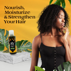 RA Cosmetics Ambunu Oil droplet on palm ready for scalp nourishment.