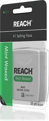 Mint-flavored waxed Reach dental floss texture close-up