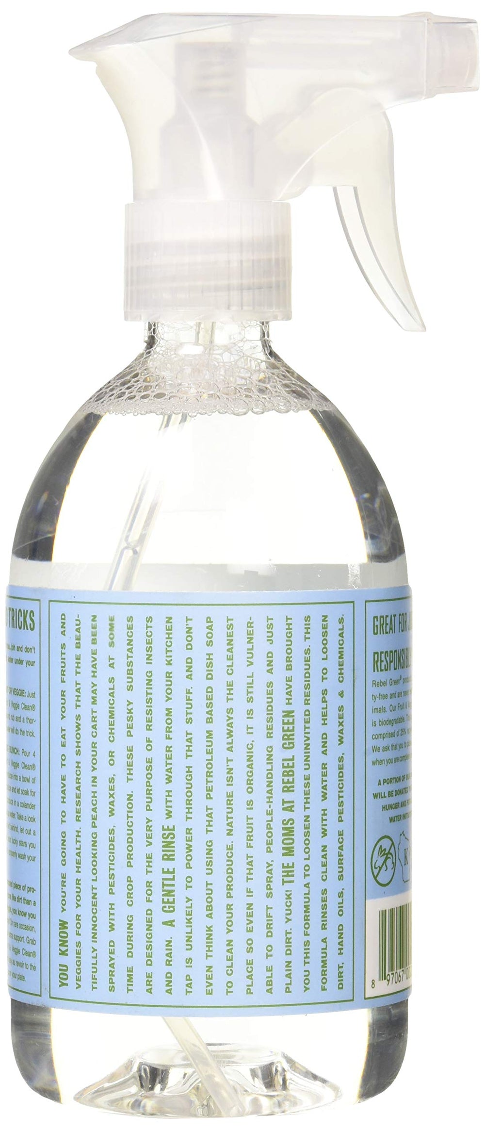 Spraying Rebel Green cleaner onto fresh fruits and vegetables