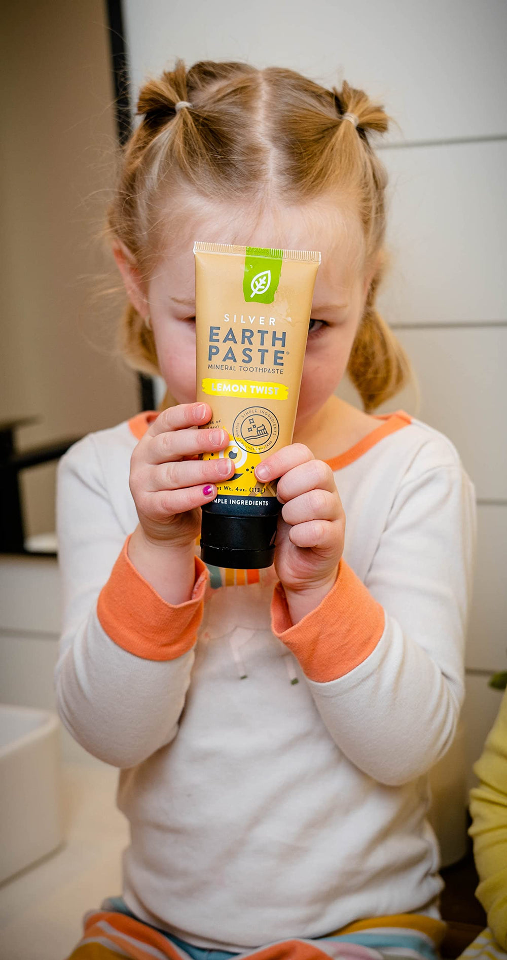 Close-up of Earthpaste texture and packaging