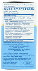 Probiotic capsules next to bottle