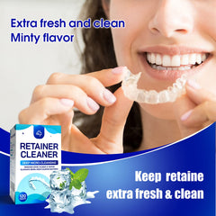 Close-up of braces and retainers undergoing cleaning