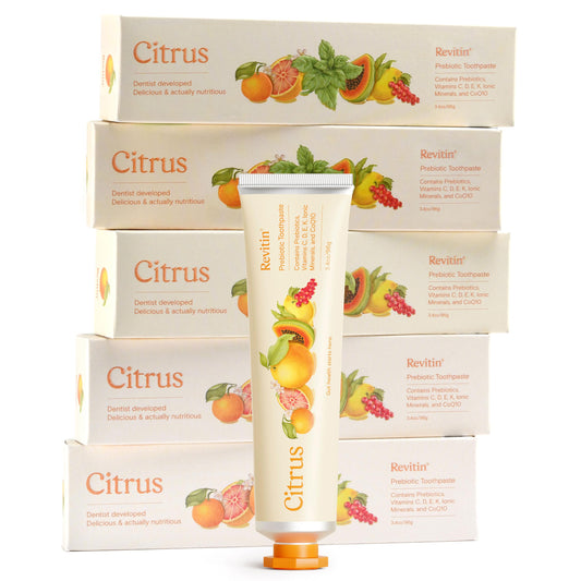 Revitin fluoride-free citrus toothpaste tube on white background
