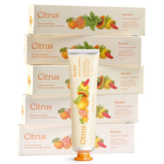 Revitin fluoride-free citrus toothpaste tube on white background