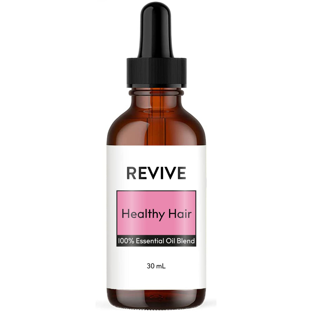 Bottle of REVIVE Healthy Hair Essential Oil Blend