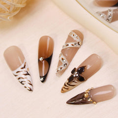 RIICFDD press-on nail kit includes 10 nails, glue, and cuticle stick for a quick fit.