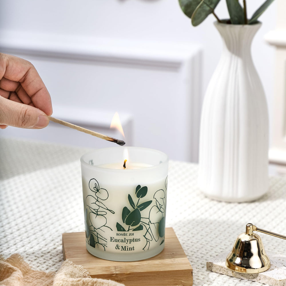 ROMIIE ZOI candle in a cozy room setting