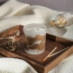 ROMIIE ZOI Pineapple candle lit, showing a clean burn