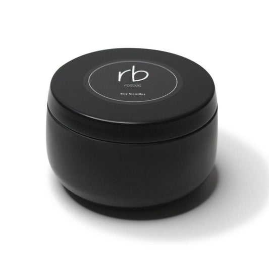 Rosbas Palo Santo candle in black tin closeup for ambient relaxation and clean burn.