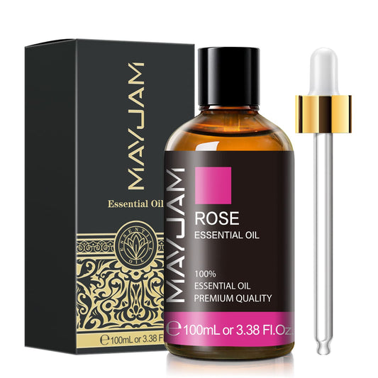 Amber glass bottle of rose essential oil, 100 ml