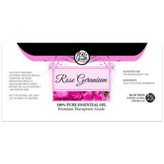 Close-up of pouring rose geranium essential oil