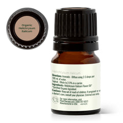 Rosehip carrier oil with Helichrysum Italicum essential oil bottle