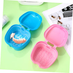 Close-up view of strainer and lid on denture case