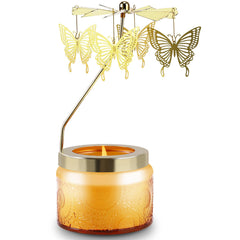 Rotatable Vanilla Cream candle with butterfly motif turning slowly