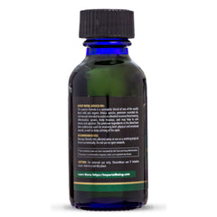 Hands applying Royal Arnica Oil during massage