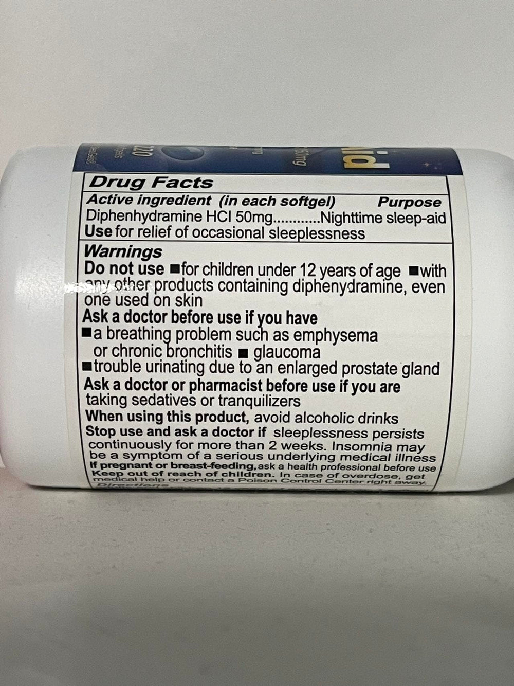RXZELL Sleep Aid bottle on nightstand evokes calm bedtime ritual.