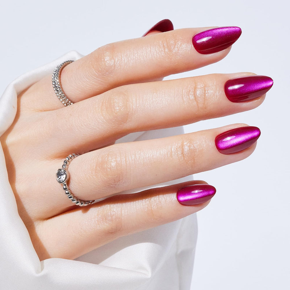 S.T. Friends almond press-on nails with red cat eye finish for quick salon-style nails