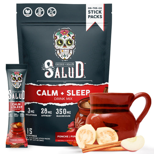 Salud 2-in-1 Sleep Aid + Calm Drink Mix Ponche flavor sachet beside a glass of water