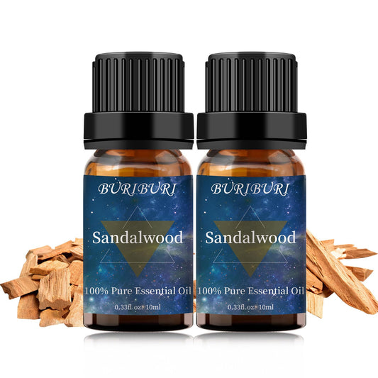 Two amber glass bottles of Sandalwood Essential Oil 10ml each