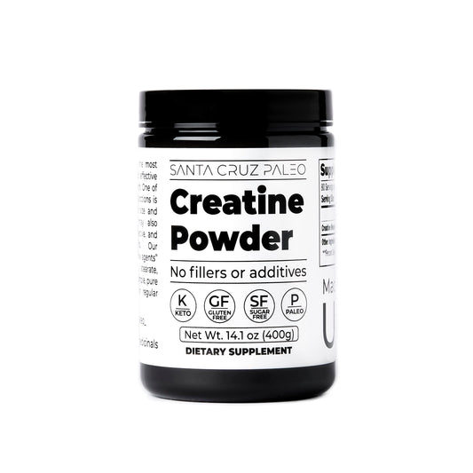 Container of Santa Cruz Paleo Creatine Monohydrate powder on a white surface
