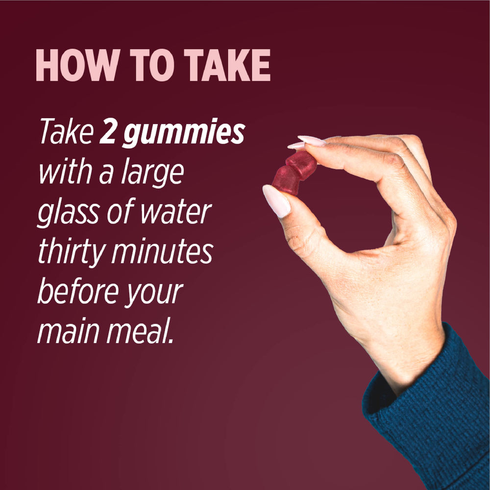 Gummies alongside a glass of water indicating serving method