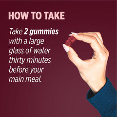 Gummies alongside a glass of water indicating serving method