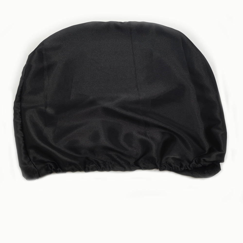 Close-up of satin car headrest cover fabric showing smooth texture