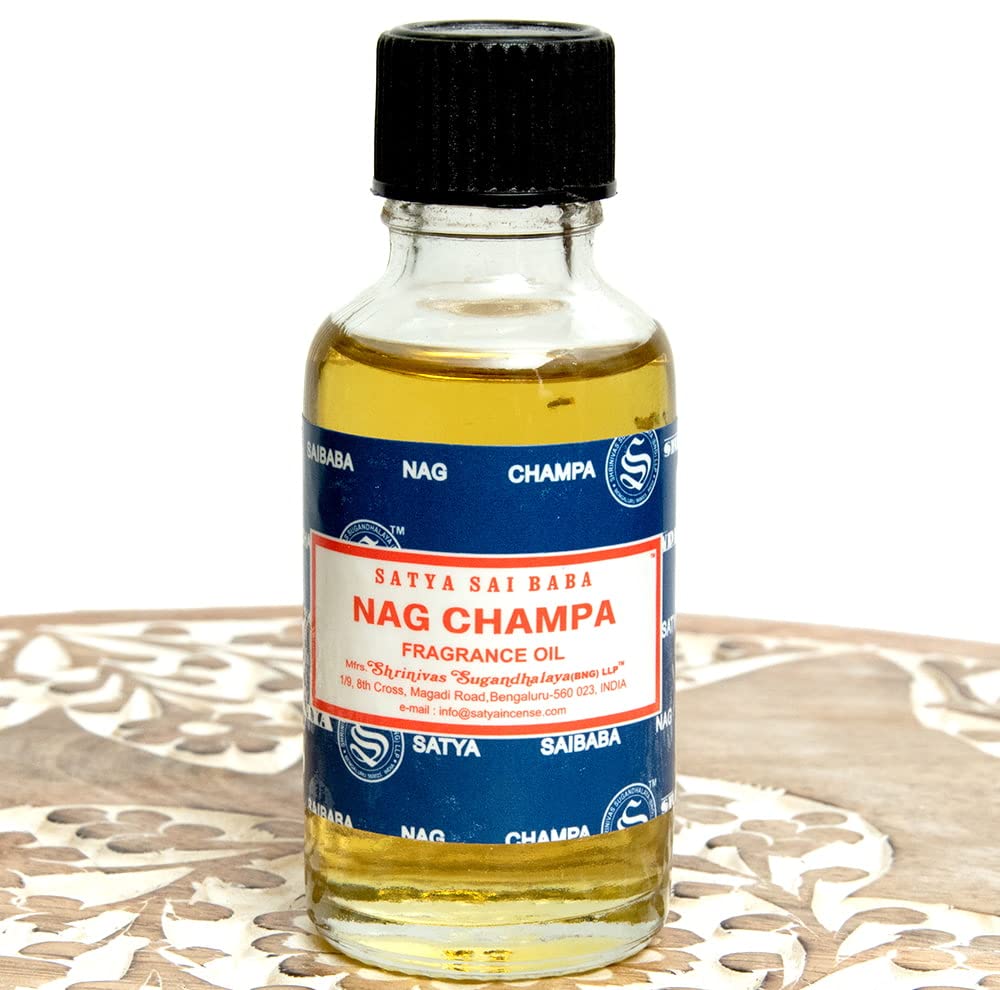 Close-up view of Nag Champa essential oil bottle label