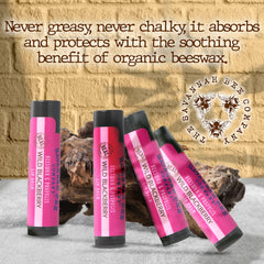 Savannah Bee lip balm wild blackberry being applied during cold weather.
