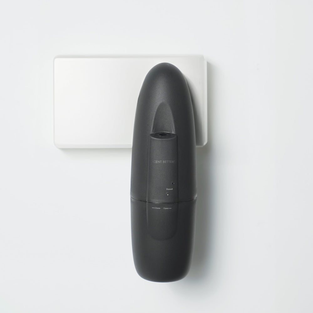 Close-up of diffuser plugged into wall outlet