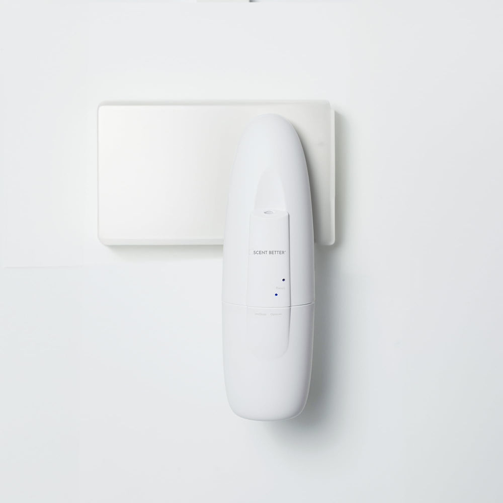 Scent Better Plug In Diffuser in white finish plugged into wall outlet