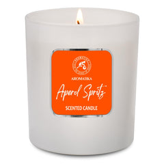 Aperol Spritz candle on a wooden surface