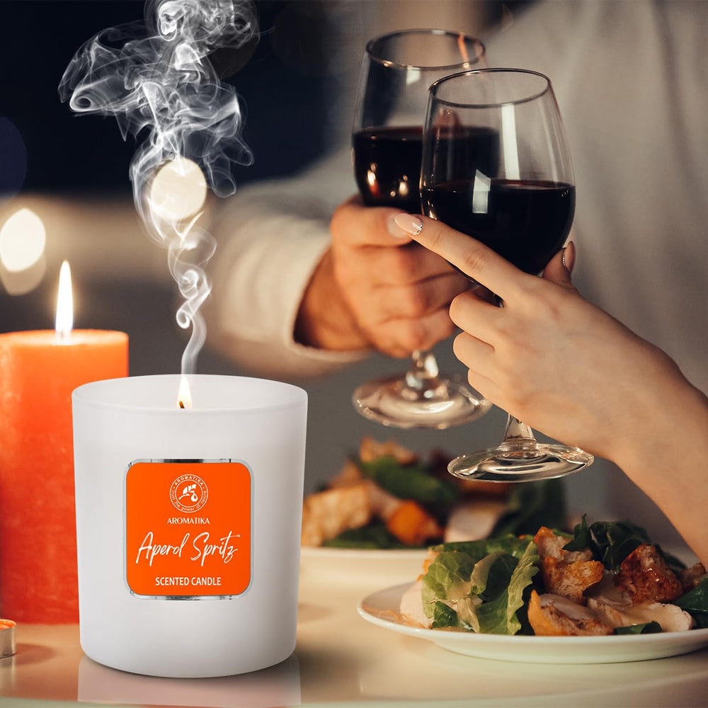 Romantic setting featuring Aperol Spritz candle