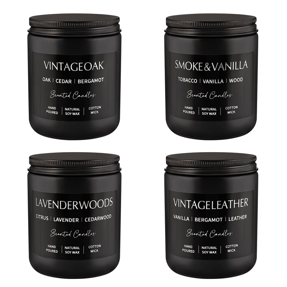 Four candles displayed in sleek black frosted can, leather/smoked vanilla scent
